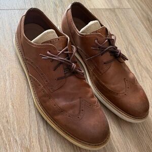 men's Cole Haan Original Grand Wingtip Oxford shoes in brown leather
